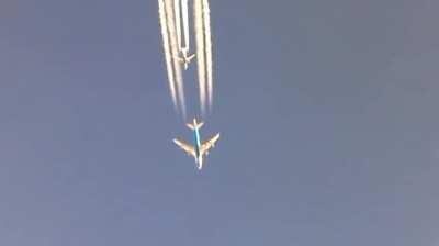 Boeing 747 overtaking a Boeing 737, Shot taken by Captain Sreekumfir from the cockpit of a 9777 Aircraft at 35000ft to 37000ft over Baghdad.