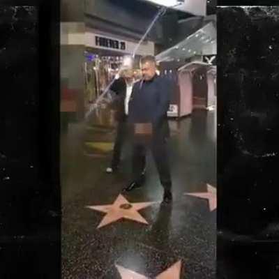 George Lopez pissing on Trump's Hollywood Star