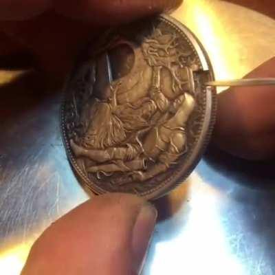 A modified Dollar Coin with a tiny sword that unlocks secret vault - 1921