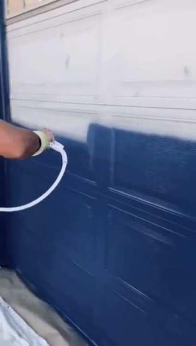 Spray painting this garage door blue