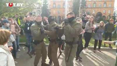 Women march is happening right now in Belarus. Woman are trying rip off the masks from undercover police and scare them away with screams.