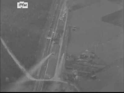 RAF Hawker Typhoon fighter-bomber attacking German train in west Soltau with unguided rockets. 1945