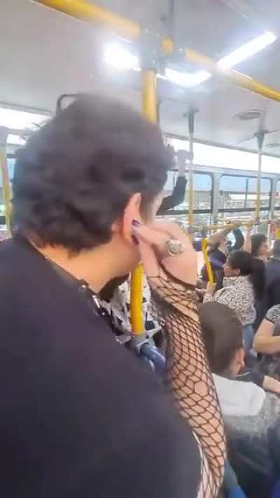 Christian woman harasses a man for wearing a skirt and makeup while riding a bus in Bogotá, Colombia 