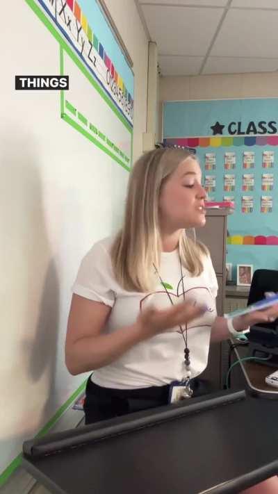 Teacher showing the power of words to her students.