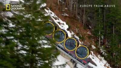 The world's steepest railway in Stoos, Switzerland. Each circular &quot;pod&quot; rotates to keep the floor level as it climbs to a maximum incline of 110%