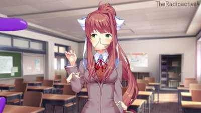 Monika gets special attention from animated magic floating hands.