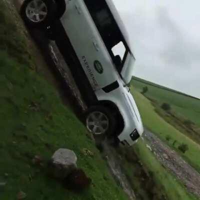 Land Rover defender steep climb on reverse