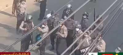 Myanmar police jump with joy when they shoot someone and chase them during protests for freedom from military rule.