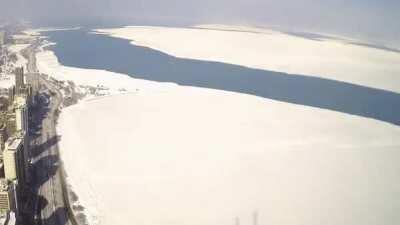 Giant section of ice covering Lake Michigan around the Chicago shoreline breaking off and drifting away