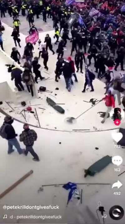 The video of the siege from this angle is so different and much more crazy than I thought. Also is that the Korean and Japanese flag in the back?