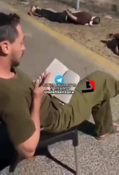 Leaked footage shows Israeli occupation soldiers torturing Palestinian detainees arrested from the occupied west bank, lying on the ground and on the stones. Meanwhile, an Israeli soldier seemingly reads the Jewish Torah book and provokes them.