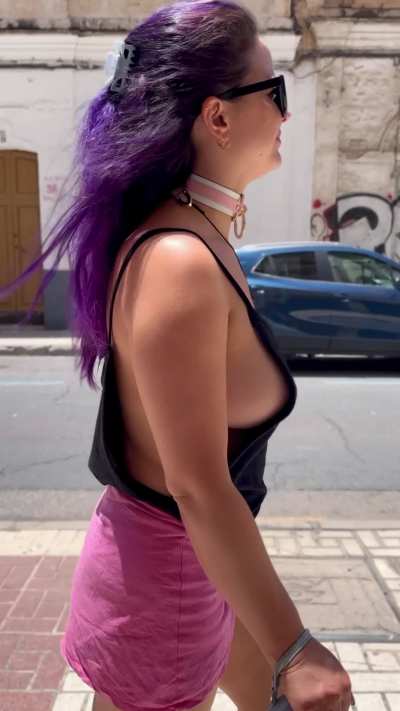 A little sideboob while walking braless