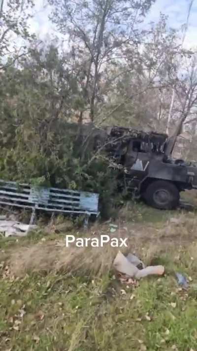 Russian serviceman shows the damage his vehicle suffered after an FPV drone attack, can someone translate?