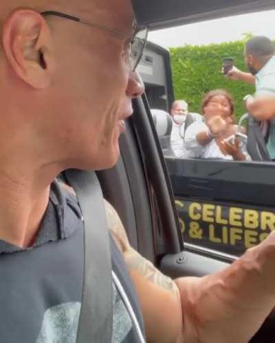 The rock surprising a celebrity star tour bus