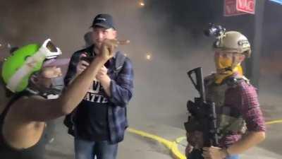 Kenosha protester confronts armed man and his reasons for being there.