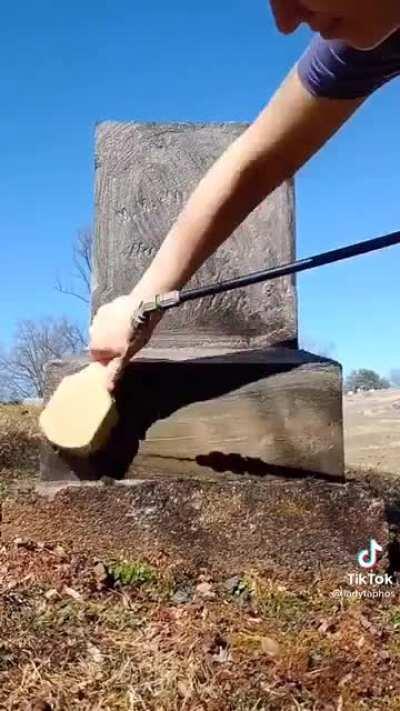 Watch someone transform a neglected tombstone