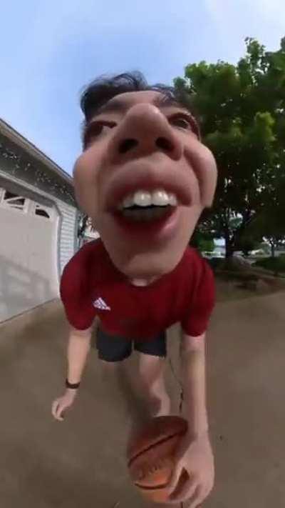 Guy plays basketball with a 360 camera in his mouth...