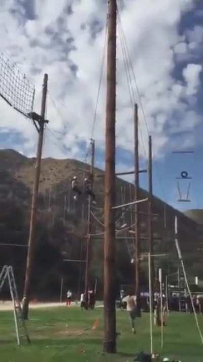 The guy running a giant swing ride doesn't see ladder - twice