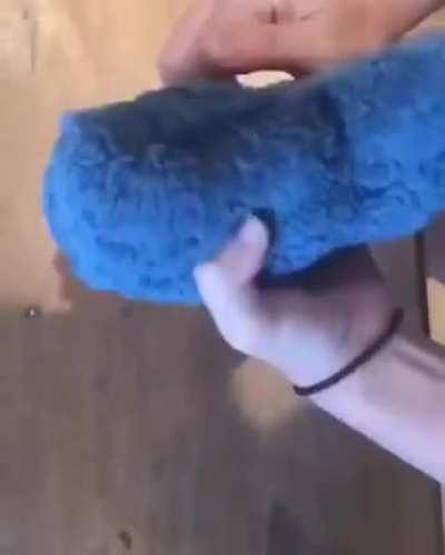 Making a teddy bear out of a wash cloth/towel.