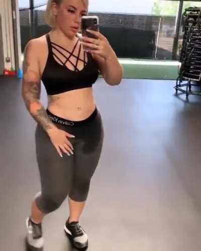 checking herself out after a workout