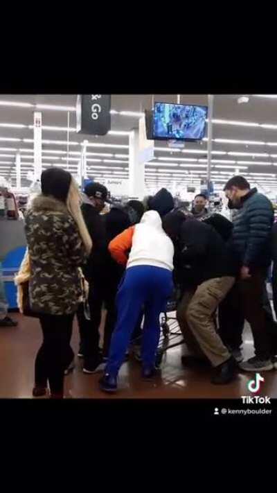 13 grown adults fighting over a Children’s trading card game at Walmart