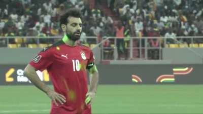 Mo Salah taking a penalty for Egypt with laser pointers in his eyes earlier today