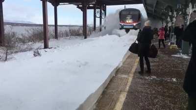 Amtrak train knocks over commuters with snow wave