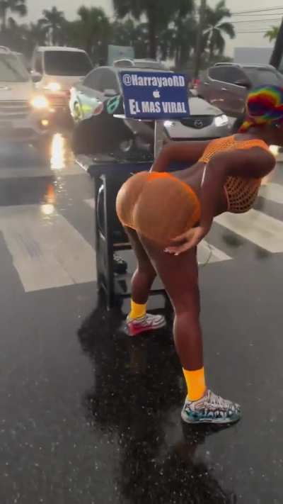 Twerking in the middle of the street while it's raining.