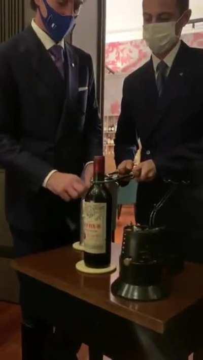 Opening Image of 7 Thousand Euro Petrus Bottle