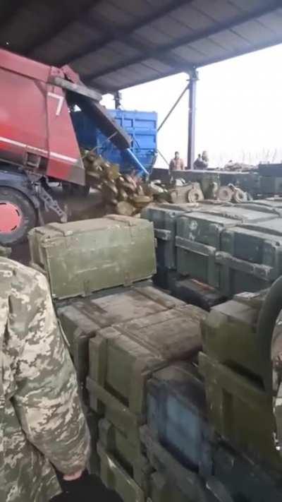 Unloading a truck full of land mines in Ukraine