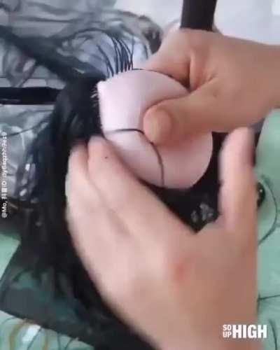 How this doll's hair is added