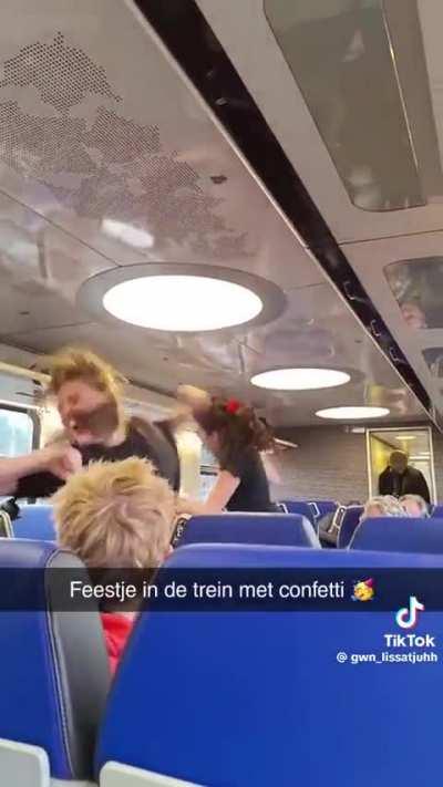 Awful, crass dancing in a Dutch train by 2 broads