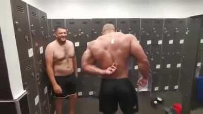 Bodybuilder Can't Reach Sticker On His Back