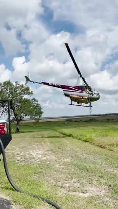 Landing a helicopter on the top of the refilling truck