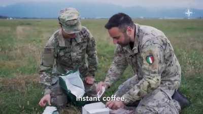 Switching MREs between an American & Italian solider