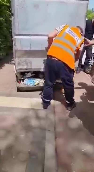 WCGW trying to pull something out of a dumpster that looks small on the outside, but is in fact a huge underground one