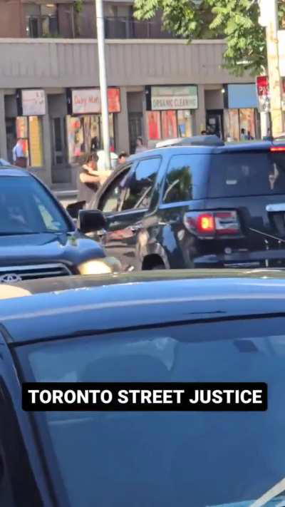 Meanwhile in the streets of Toronto. He tries to steal man's bike but gets beaten down. When another guy tries to calm things down, he tries to steal the guy's scooter.