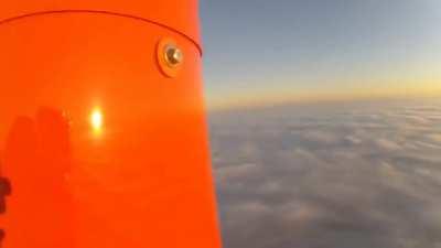 Changing a lightbulb on a 2000ft radio/tv tower.