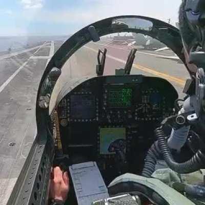 View from inside a F-18 cockpit taking off from an aircraft carrier