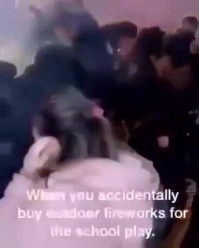 Lighting a fireworks in a school play.