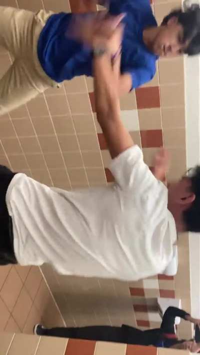 White shirt kid always reposting about how he good at boxing and gets his ass beat in a real fight 😭😭