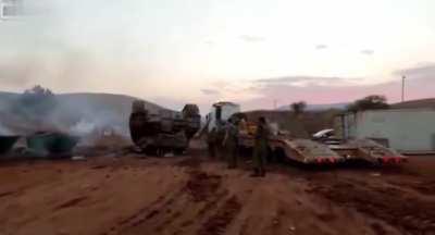 Tank being driven on load transport | Israel