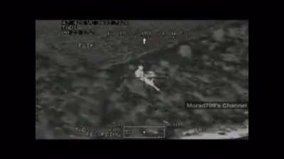 Orbiting Apache watches as insurgent has head blown off by British ground units