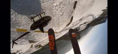 Pro Skier Candide Thovex jumping over a helicopter