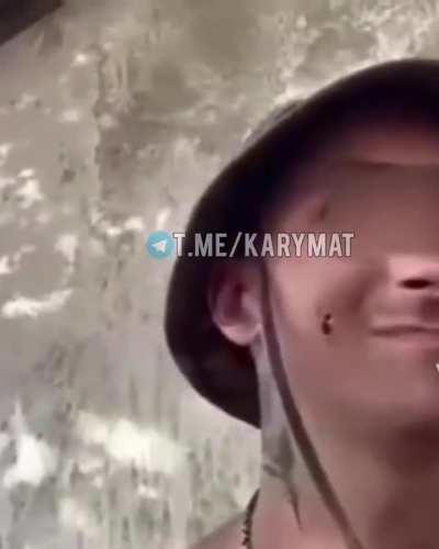 A Russian soldier filmed the moment a submunition of a cluster projectile hit his face