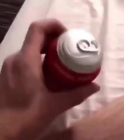 Opening an inflated can of coke