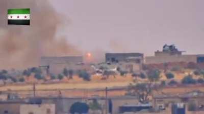 FSA fighters hit a SAA tank with a TOW missile causing it to spectacularly combust. Southern Aleppo. June 9th, 2016.