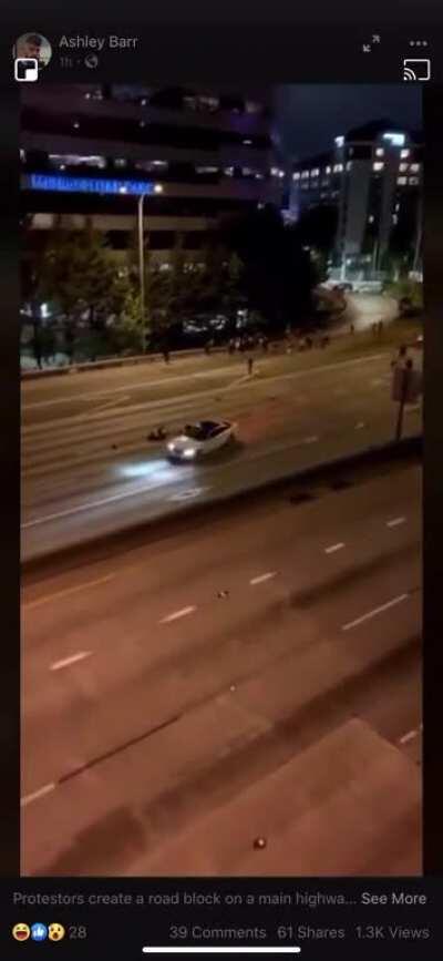 Car yeets person in the middle of the street.