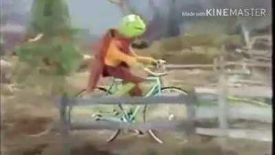 Kermit on a bike