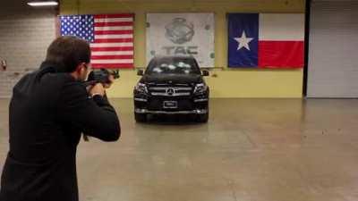 CEO of a bulletproof car company puts his money where his mouth is in a live test .